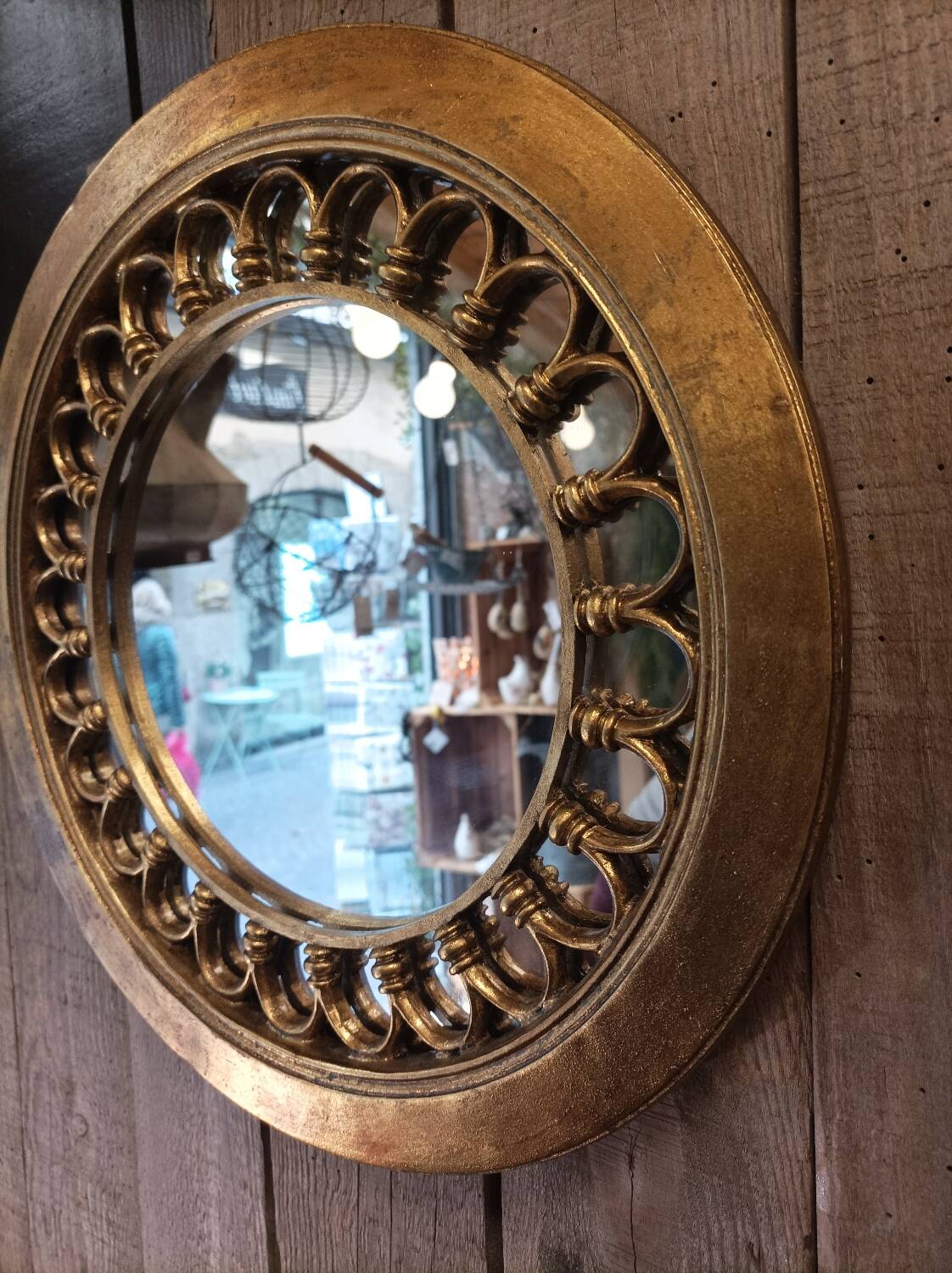 Round golden mirror