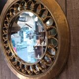 Round golden mirror