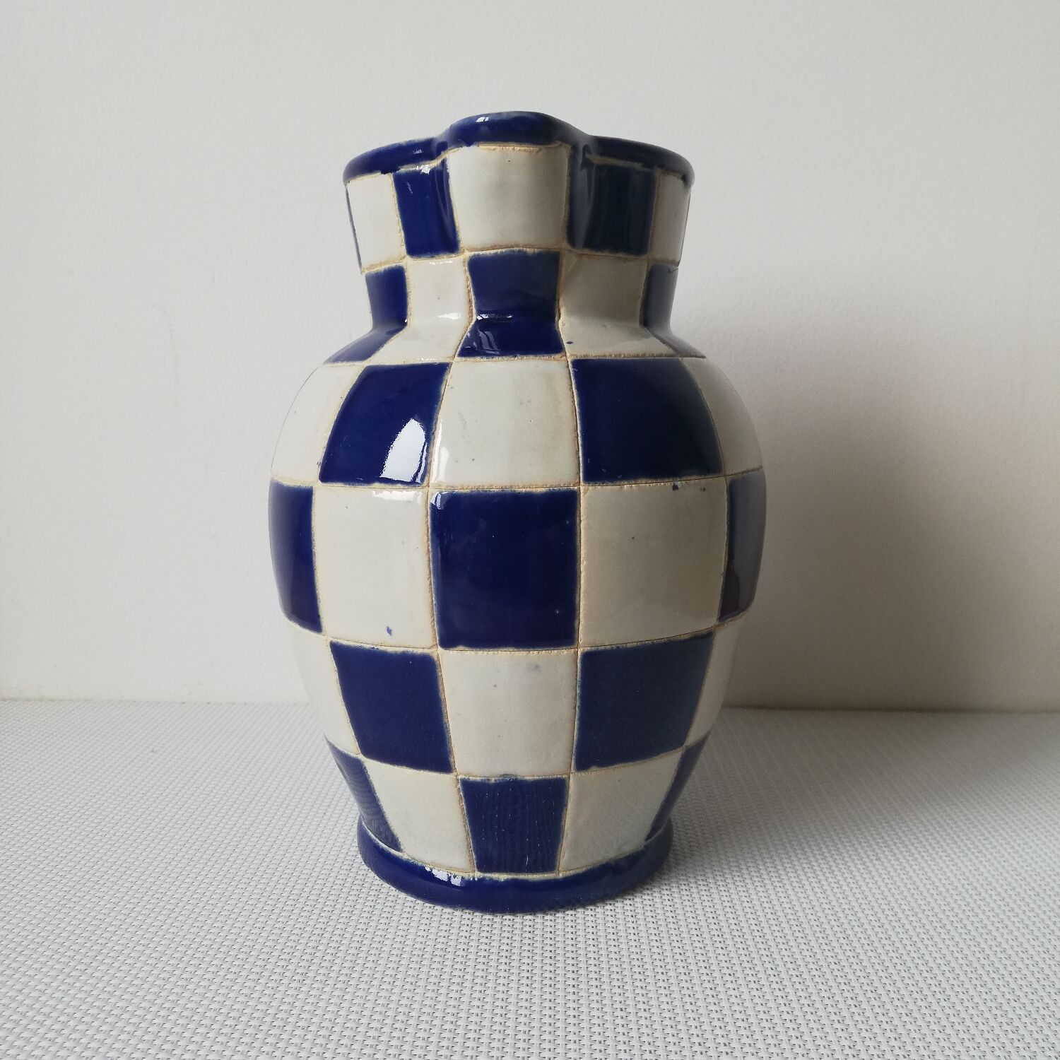 Checkerboard pitcher