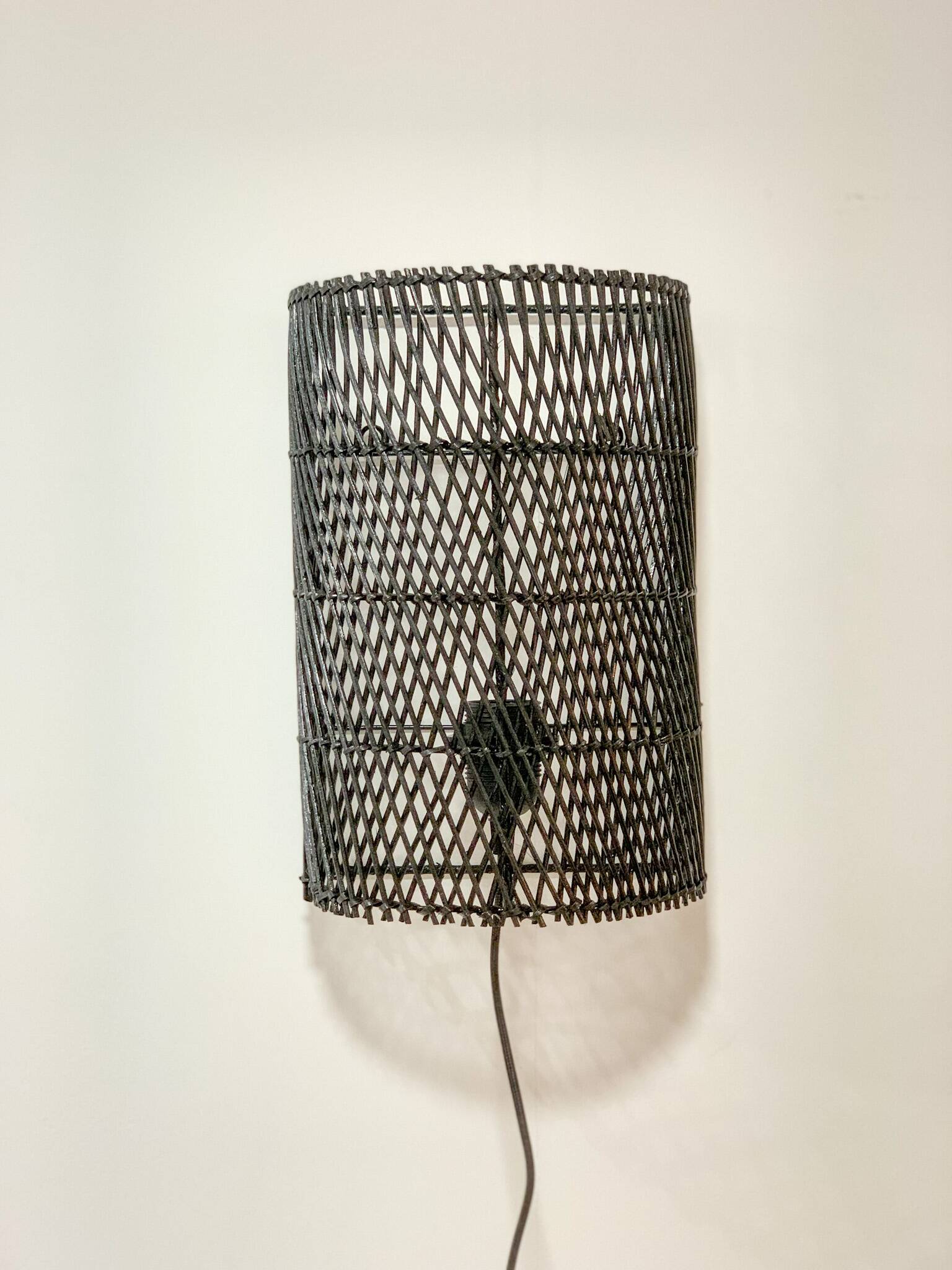 Black rattan wall light