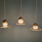 Trio of Art Deco grooved glass pendant lights, 1920s-30s