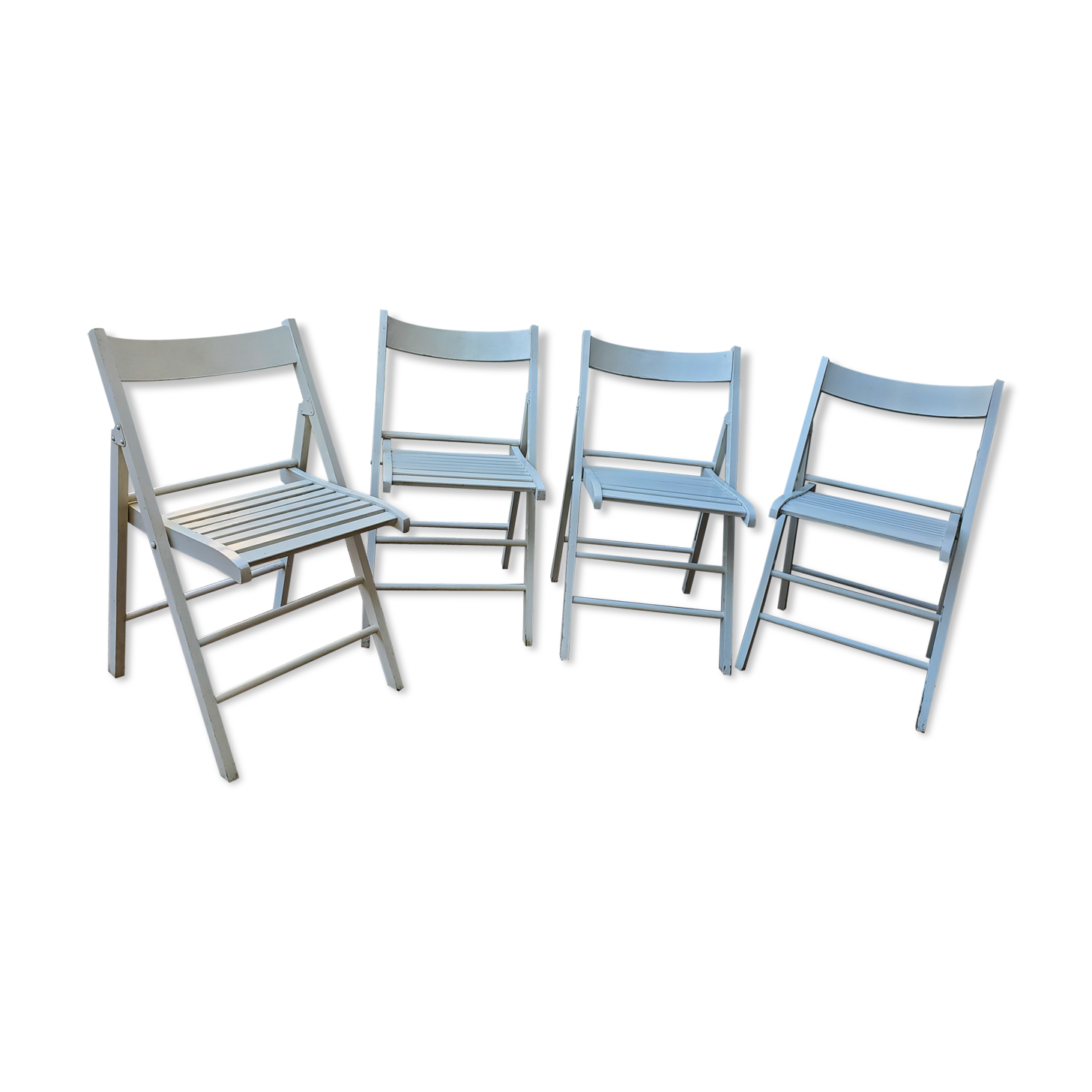 4 folding chairs made of 70's wood