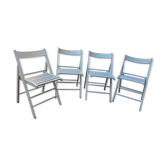 4 folding chairs made of 70's wood
