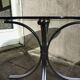 Chromed metal and smoked glass table