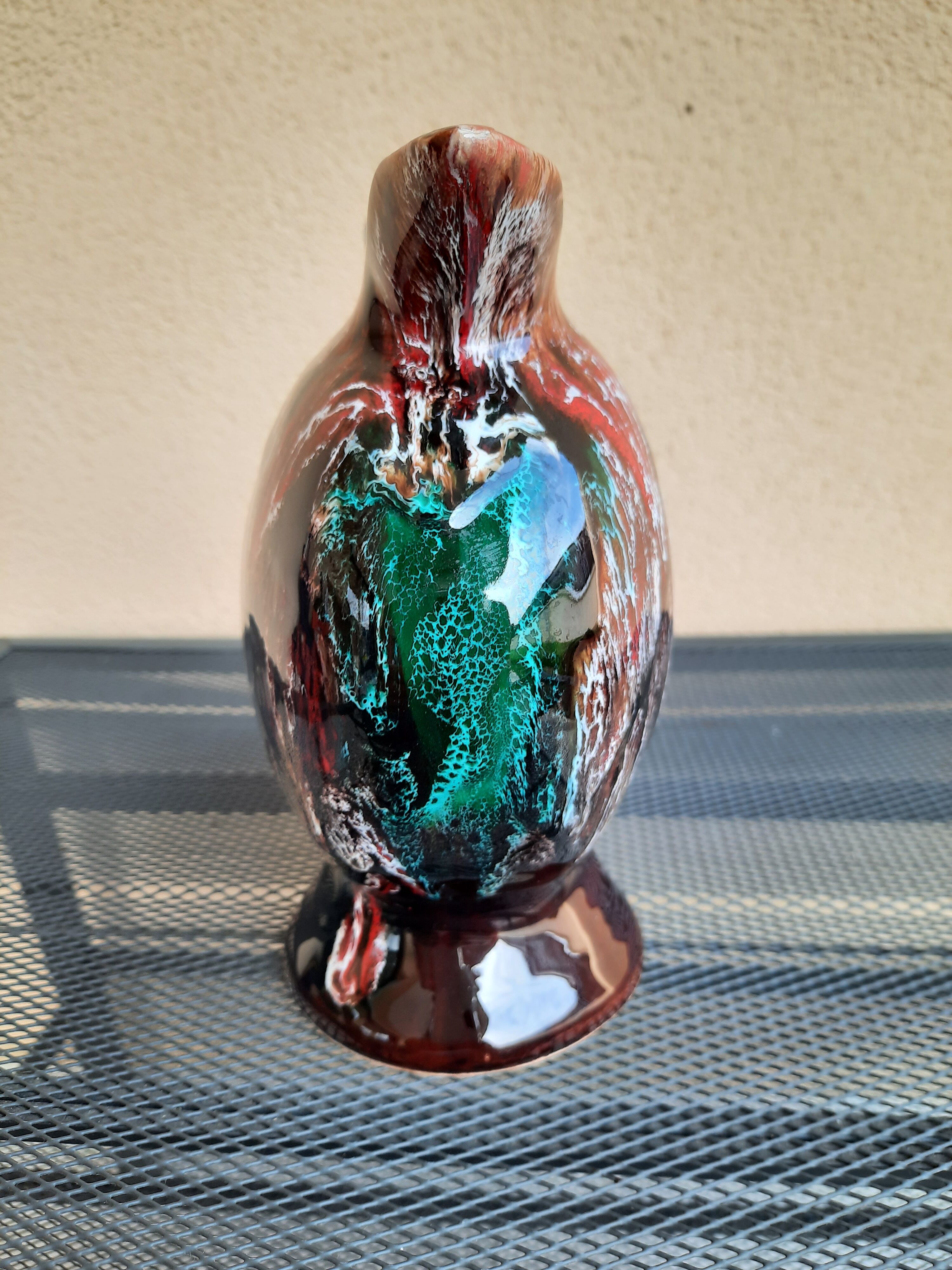 Earthenware pitcher signed vallauris, brown, orange, green, flammé décor, tbe.