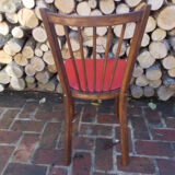 Vintage bistro chair sitting red