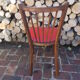 Vintage bistro chair sitting red