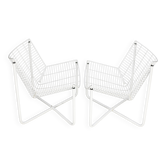 Pair of white lacquered steel rod armchairs. Circa 1985
