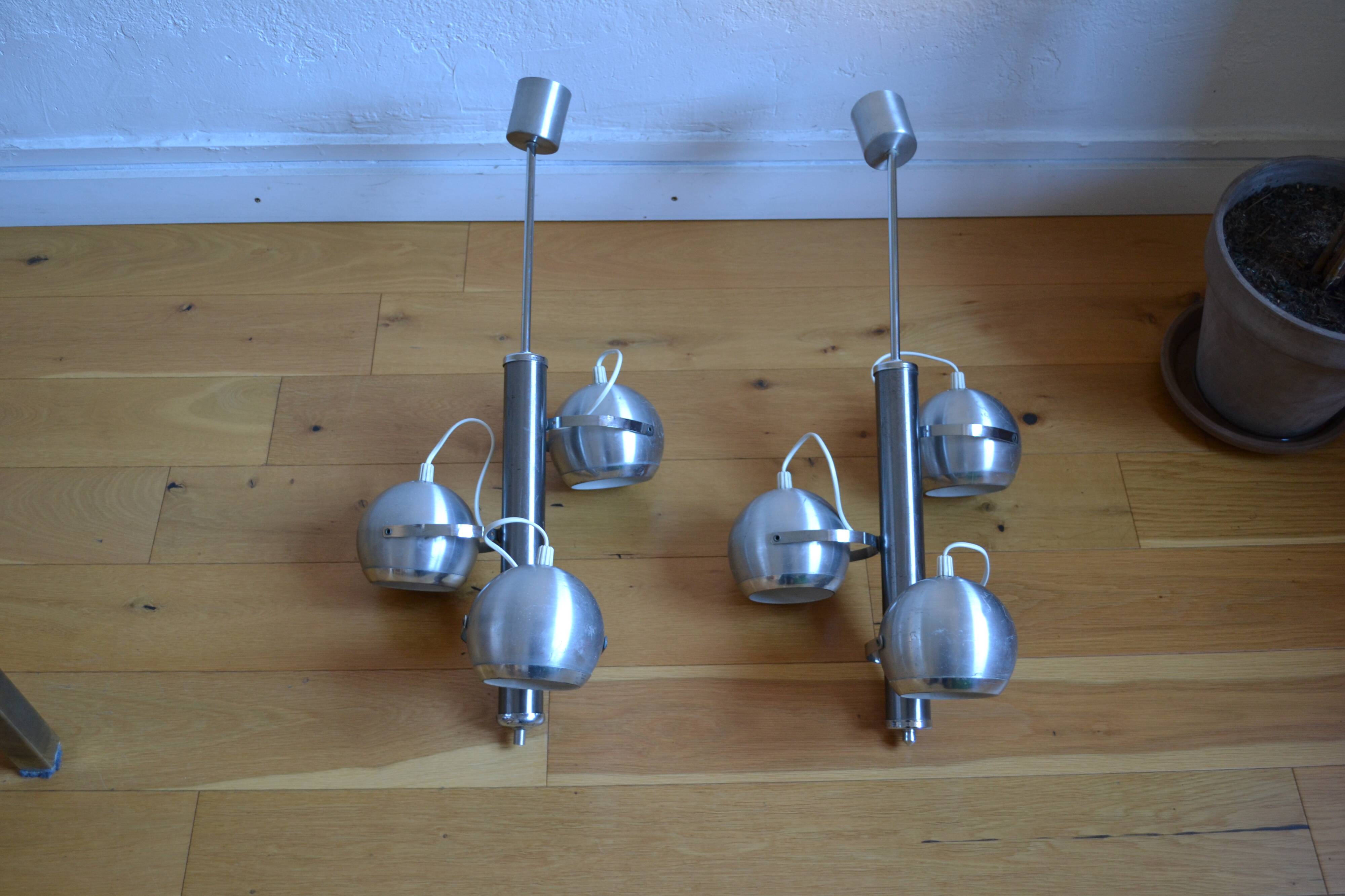 Pair of 70s space age eye ball chandeliers in brushed aluminum