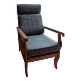 Relaxing armchair with integrated ottoman