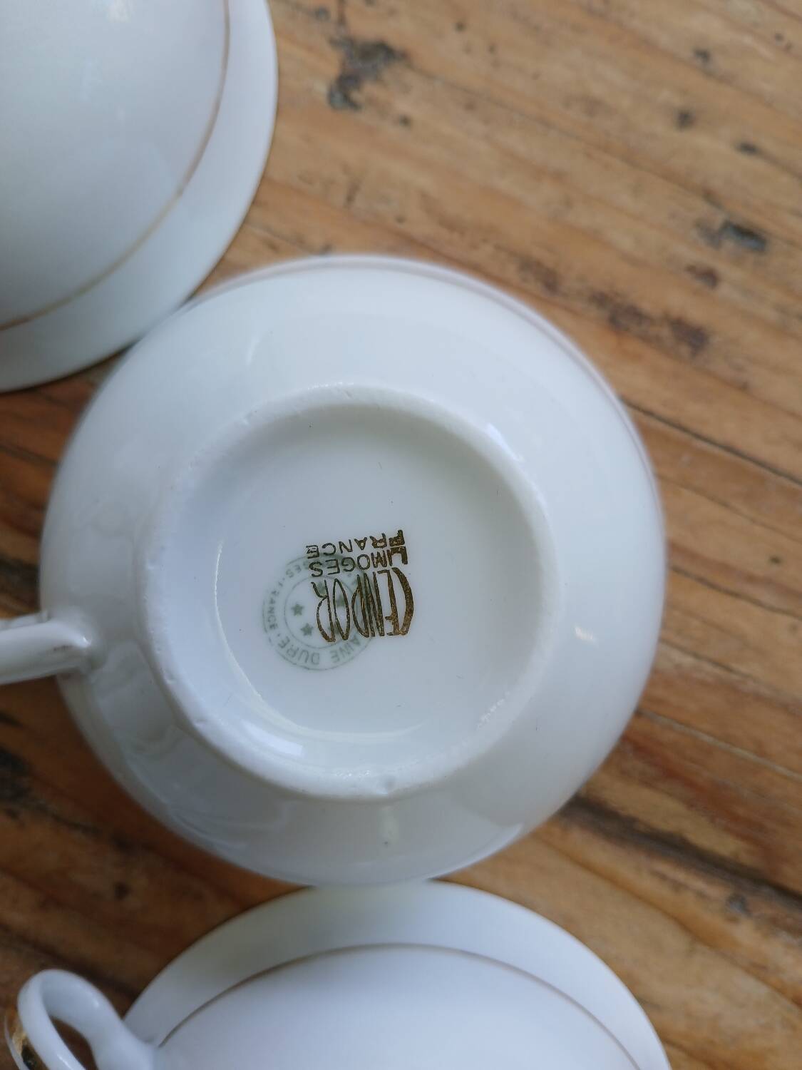 Set of 7 Limoges porcelain cups and saucers