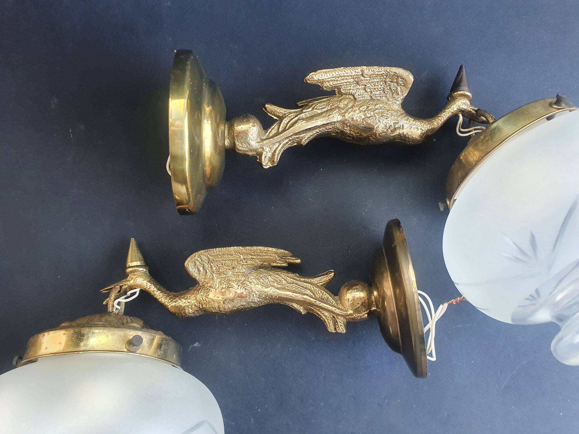 Pair of antique bronze wall sconces