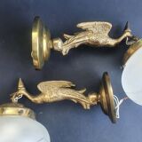 Pair of antique bronze wall sconces