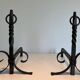Pair of Neoclassical Fire Dogs in Wrought Iron with Twisted Columns, Finials