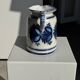 Artisan blue floral decorative carafe, height 17 cm, diameter 24.5 cm.