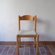 4 solid pine chairs, straw seats, shaped backrest.