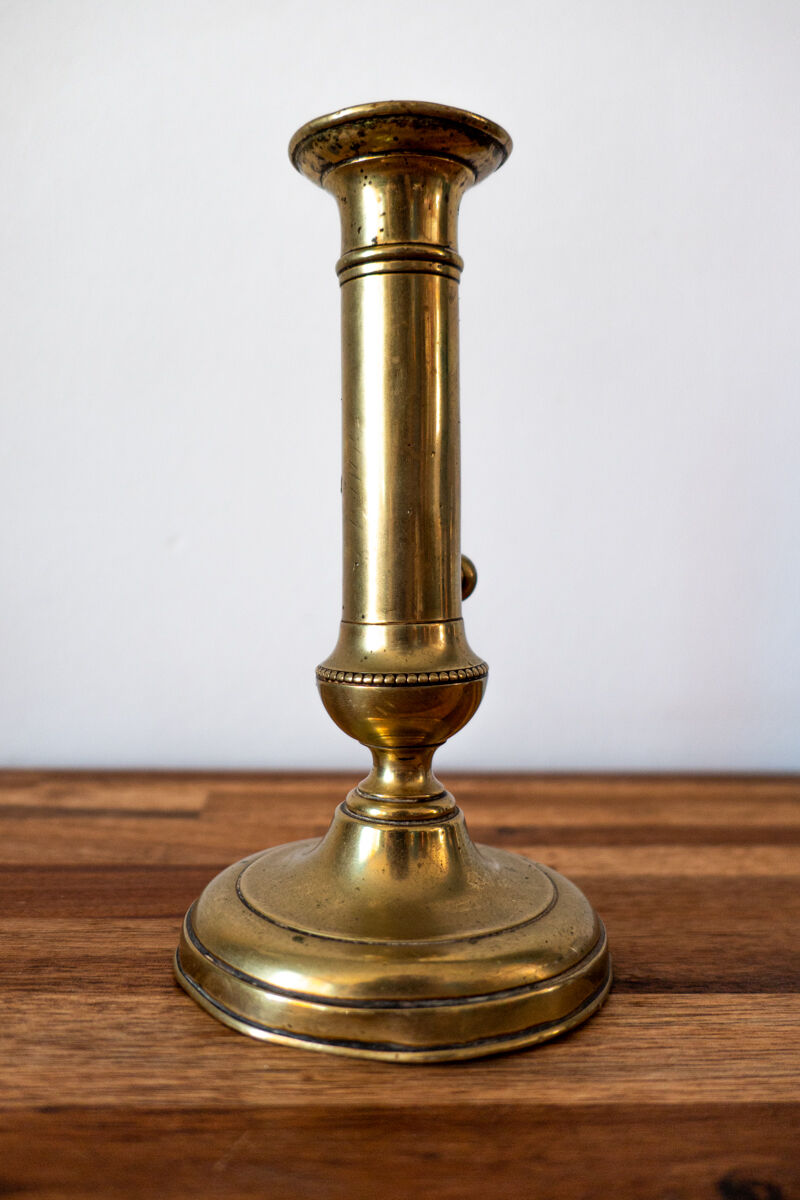 Brass push candle holder