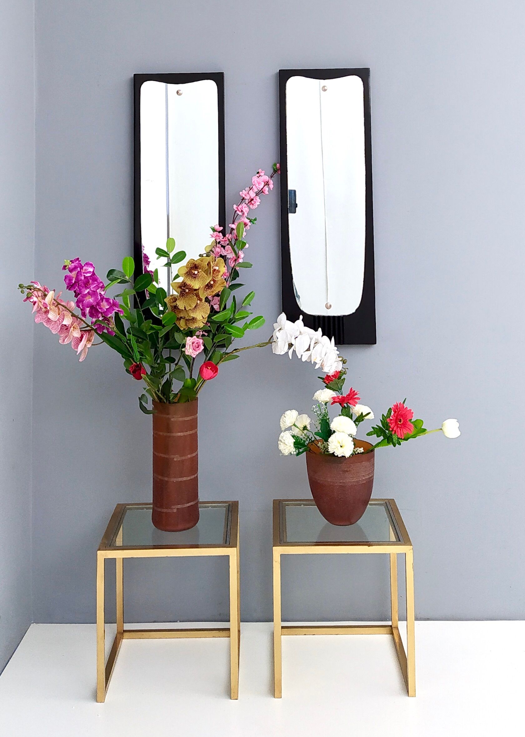 Pair of vintage ebonized wood wall mirrors, italy 1950