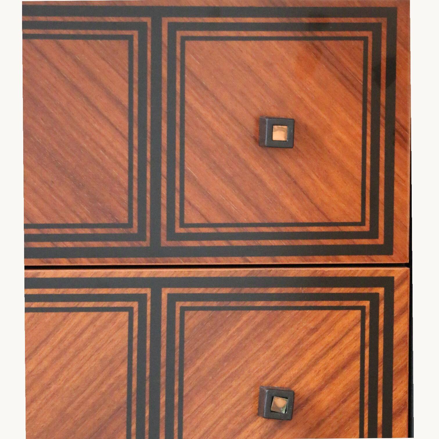 A pair of chests of drawers from the "Caccia alla Volpe" collection by Linea Arredo.