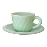 Old cup and its saucer in mint green opaline.