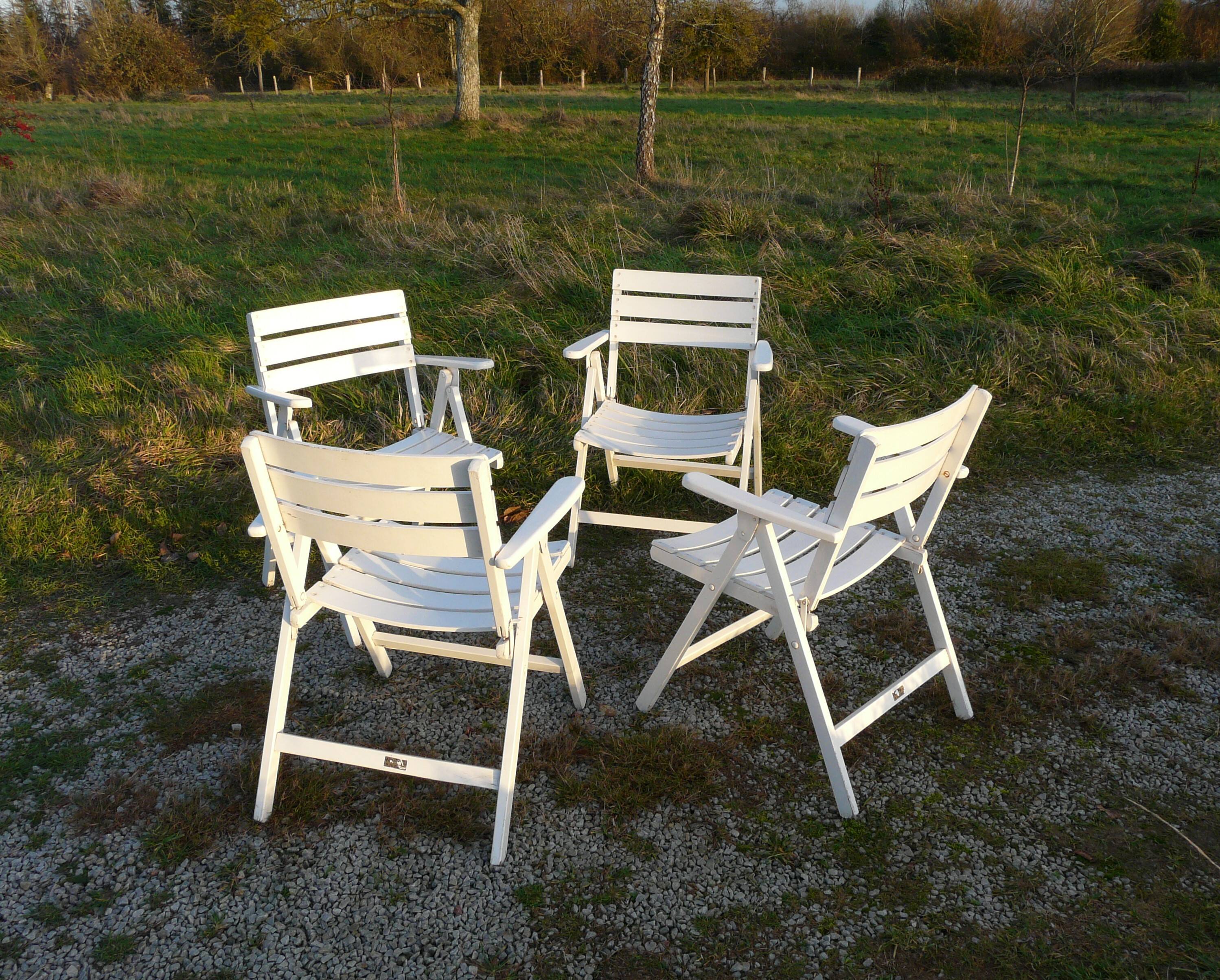 Four vintage wooden garden armchairs from the 1950s