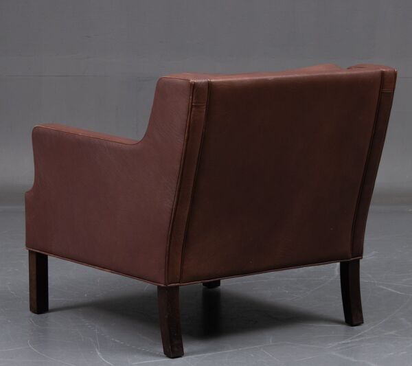 Canapé trois places en cuir et son fauteuil une place , style scandinave