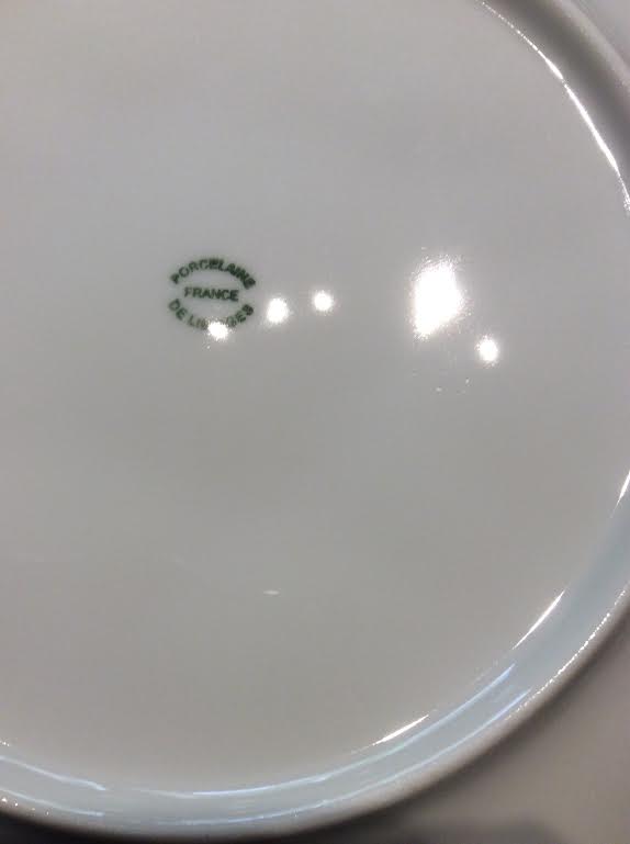 3 white porcelain plates