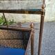 2 brass trundle tables and vintage black glass