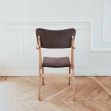 Renovated vintage armchair, bridge from the 1950s.