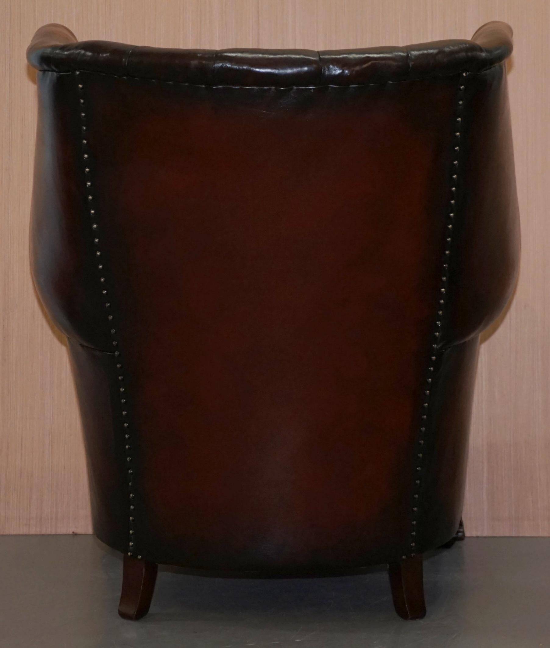 Victorian leather canapé and armchair, barrel back, circa 1860, restored.