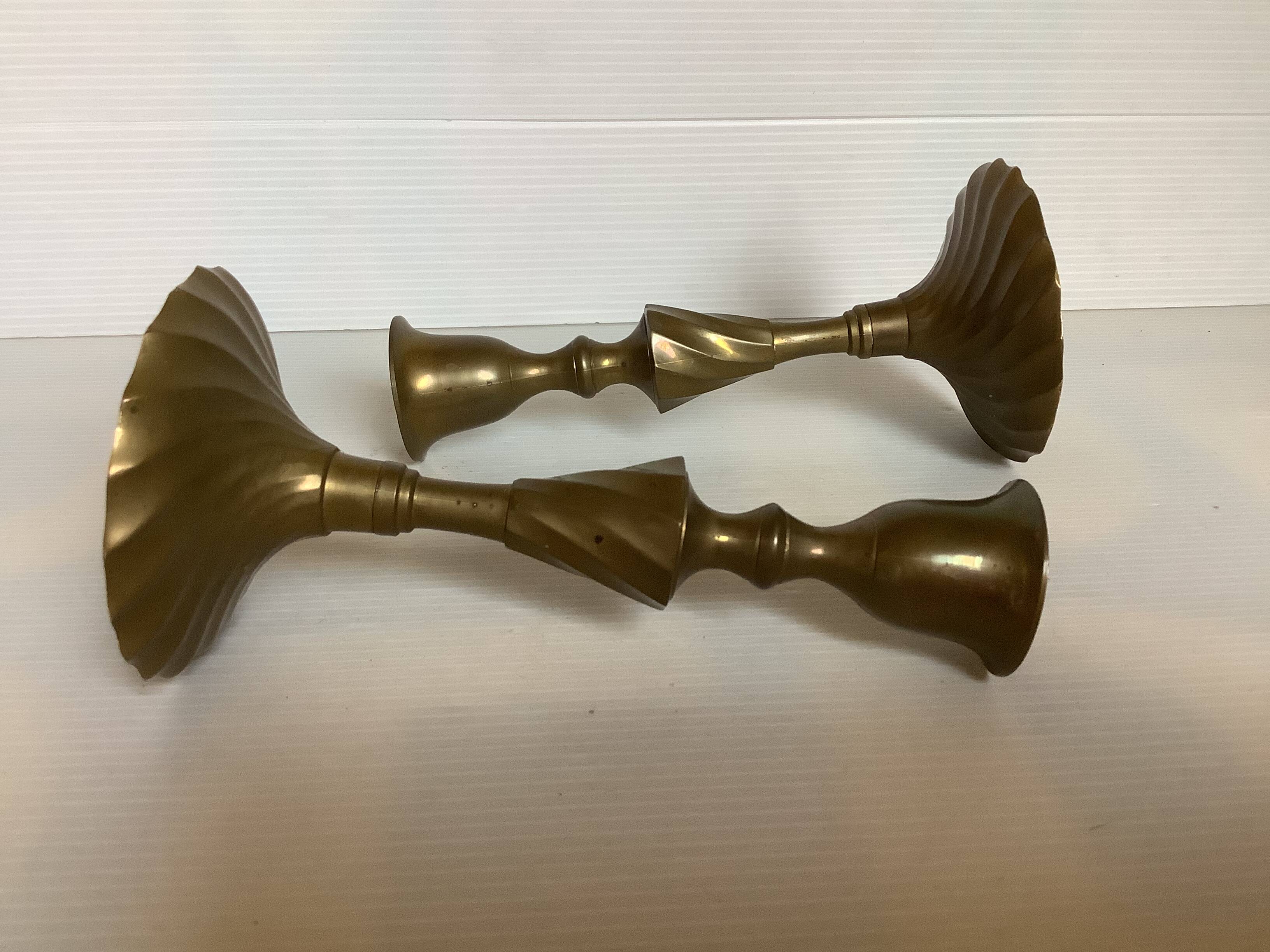 Pair of twisted brass candlesticks