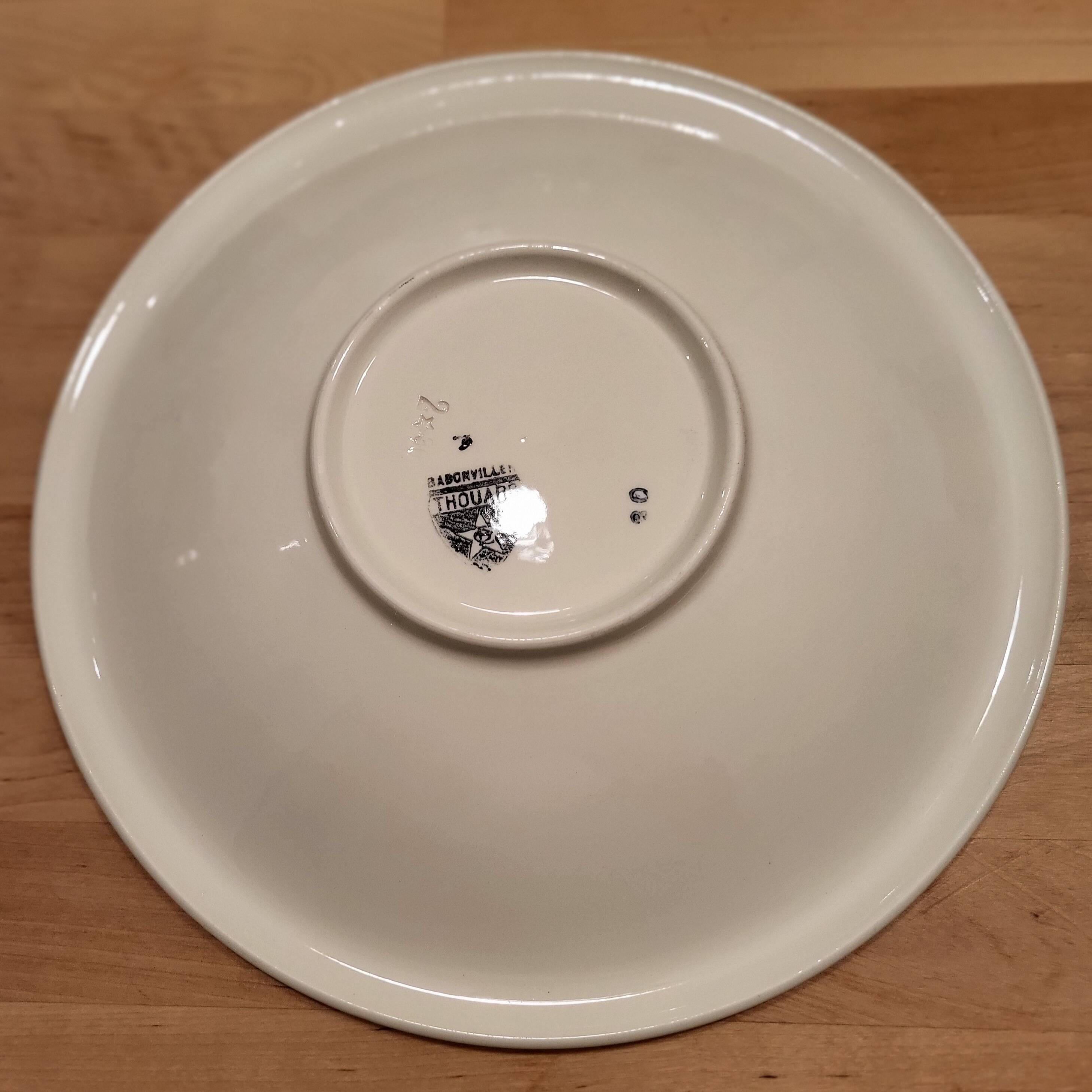 Round service plate demi-void signed Badonviller Thouars Art Deco