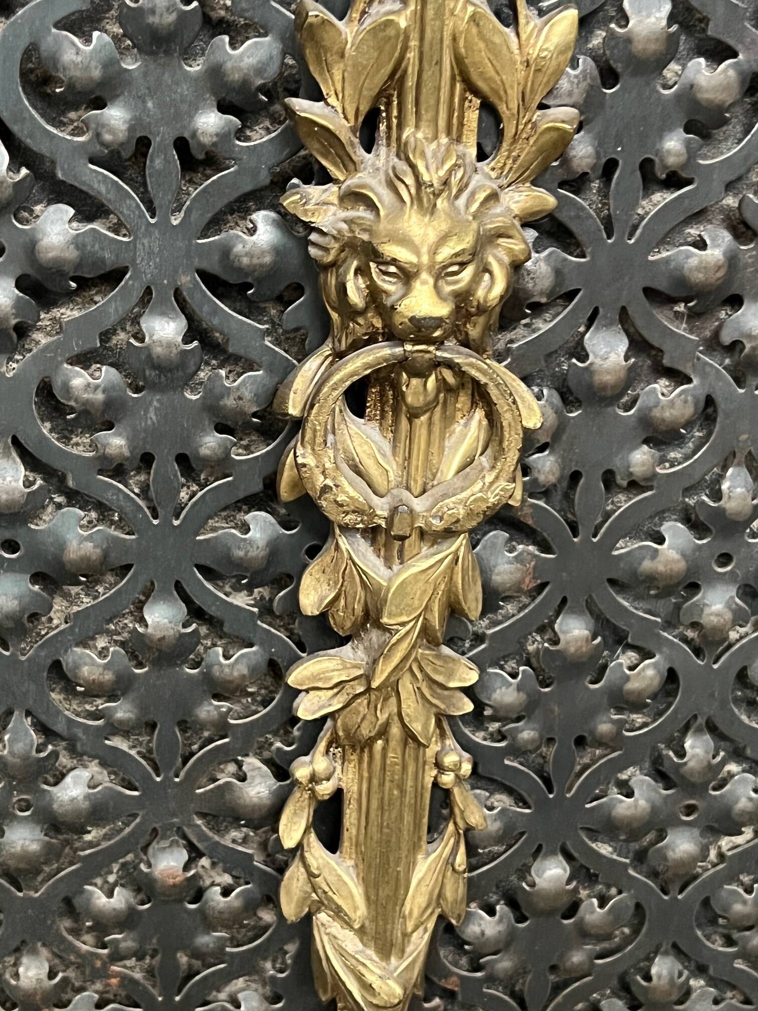 Fireplace screen. Bronze, copper, metal, gilding.