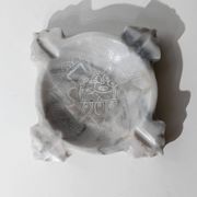 Vintage Mexican marble ashtray from the 1970s, engraved Aztec pattern.