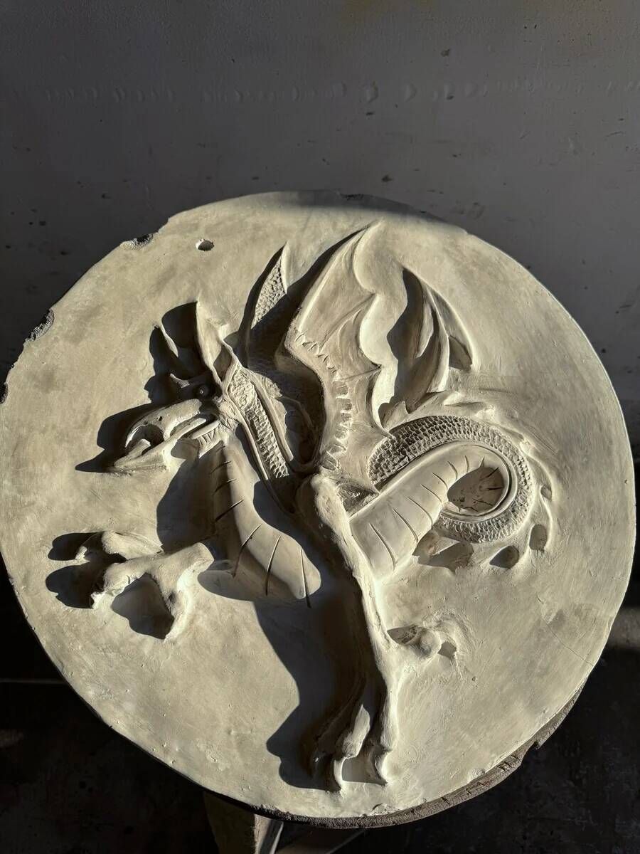 Plaster dragon by Walter De Buck