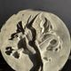 Plaster dragon by Walter De Buck
