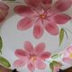 Oval serving dish with hand-painted pink flowers in San Marciano ceramic.
