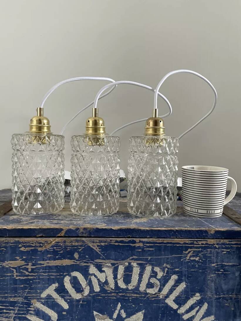 Set of three chiseled glass pendant lights of Scandinavian origin