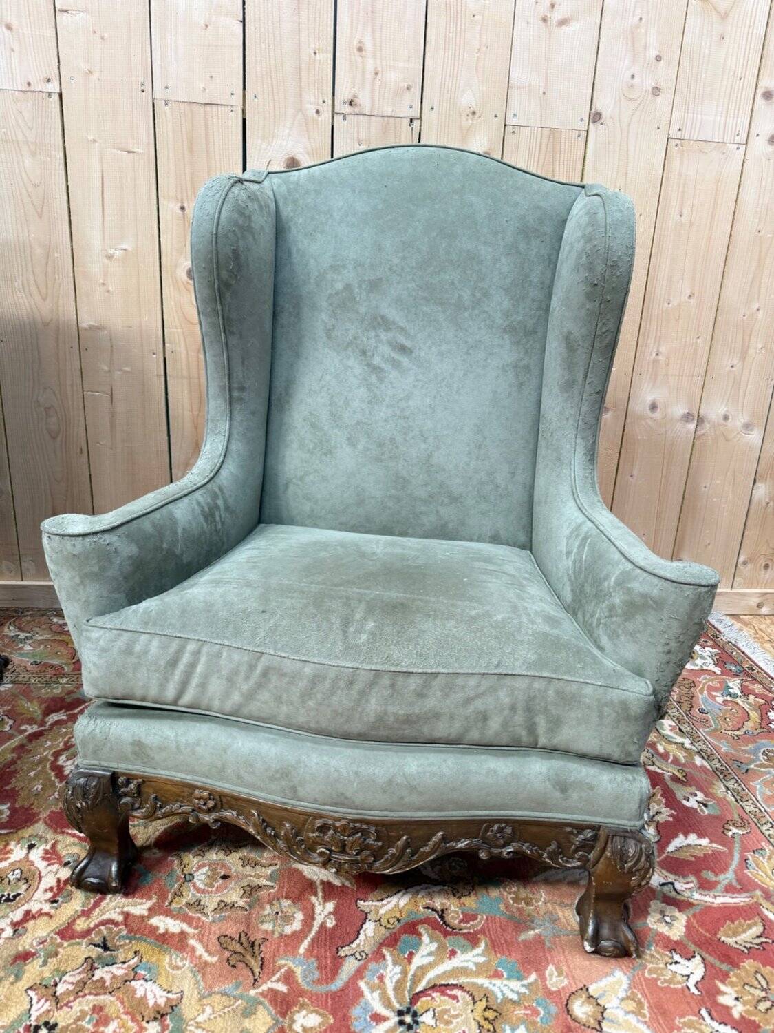 Pair of wingback armchairs in George III style – Carved wood – 18th century.