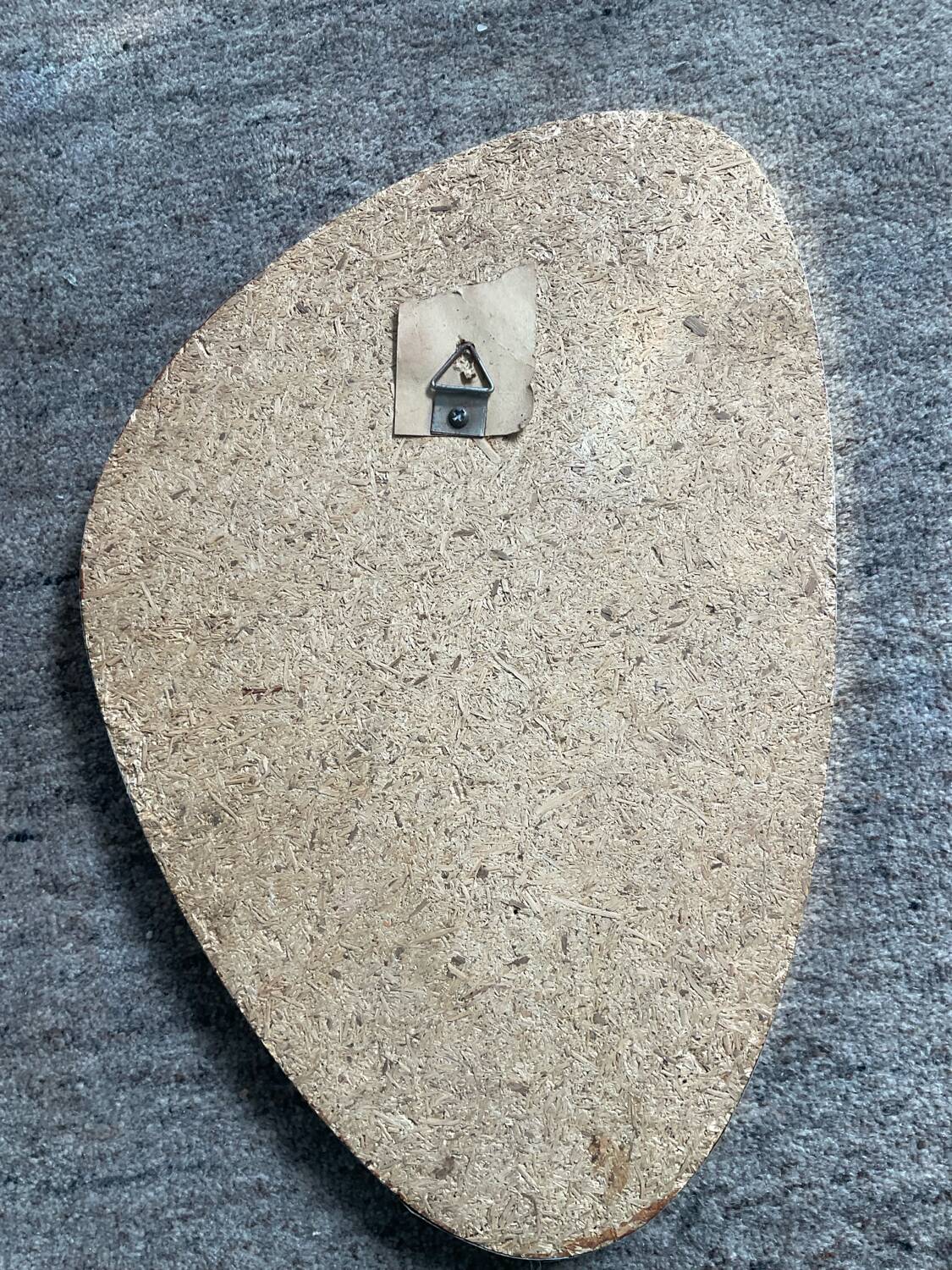 Asymmetrical free-form mirror from the 60s-70s.