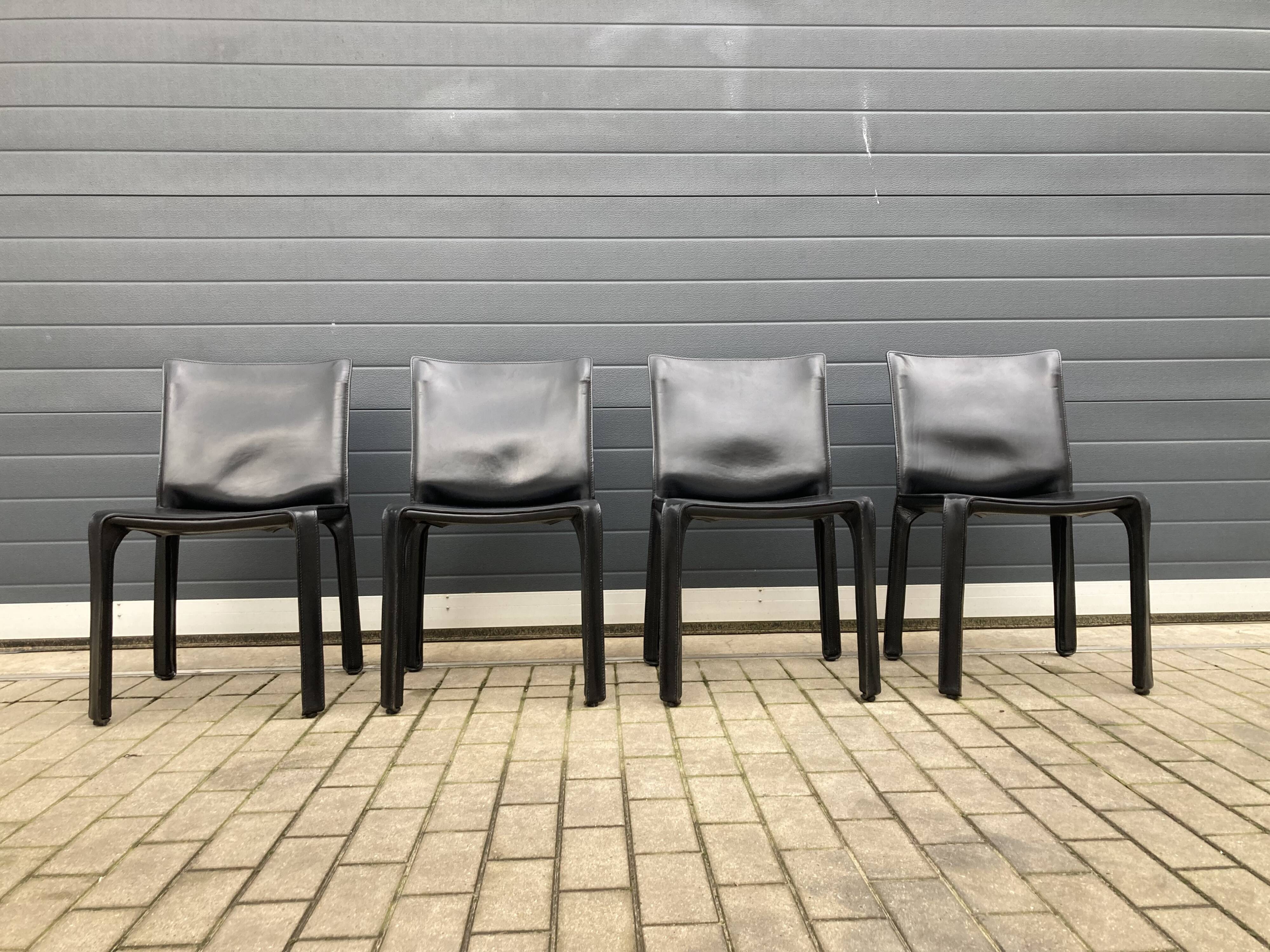 4 black Cassina Cab chairs by Mario Bellini
