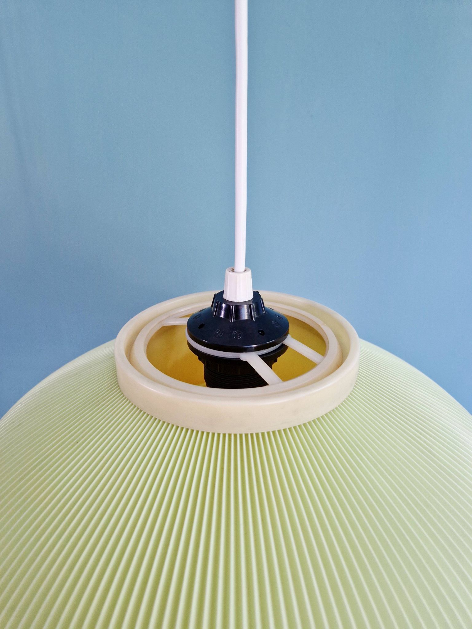 Vintage oval-shaped suspension in pleated celluloid, light green colour, 1960.