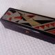Old lacquered wooden glove box/box with Art Deco geometric decoration. Japan