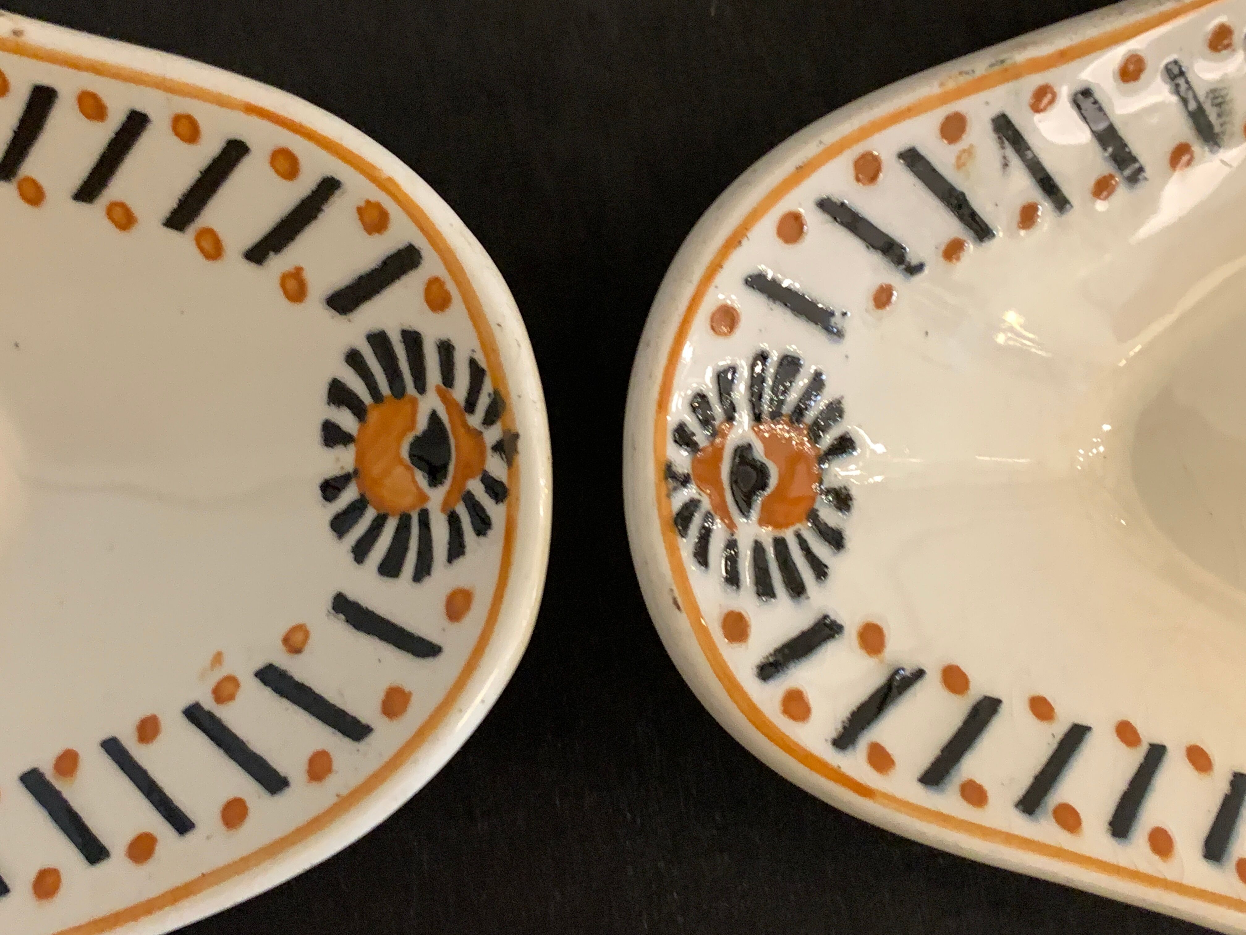 Pair of art deco raviers signed Longwy and numbered, model Gerazine
