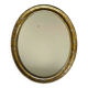 Miroir en bois doré patiné 58cm