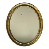 Miroir en bois doré patiné 58cm