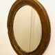 Old art deco oval wooden mirror