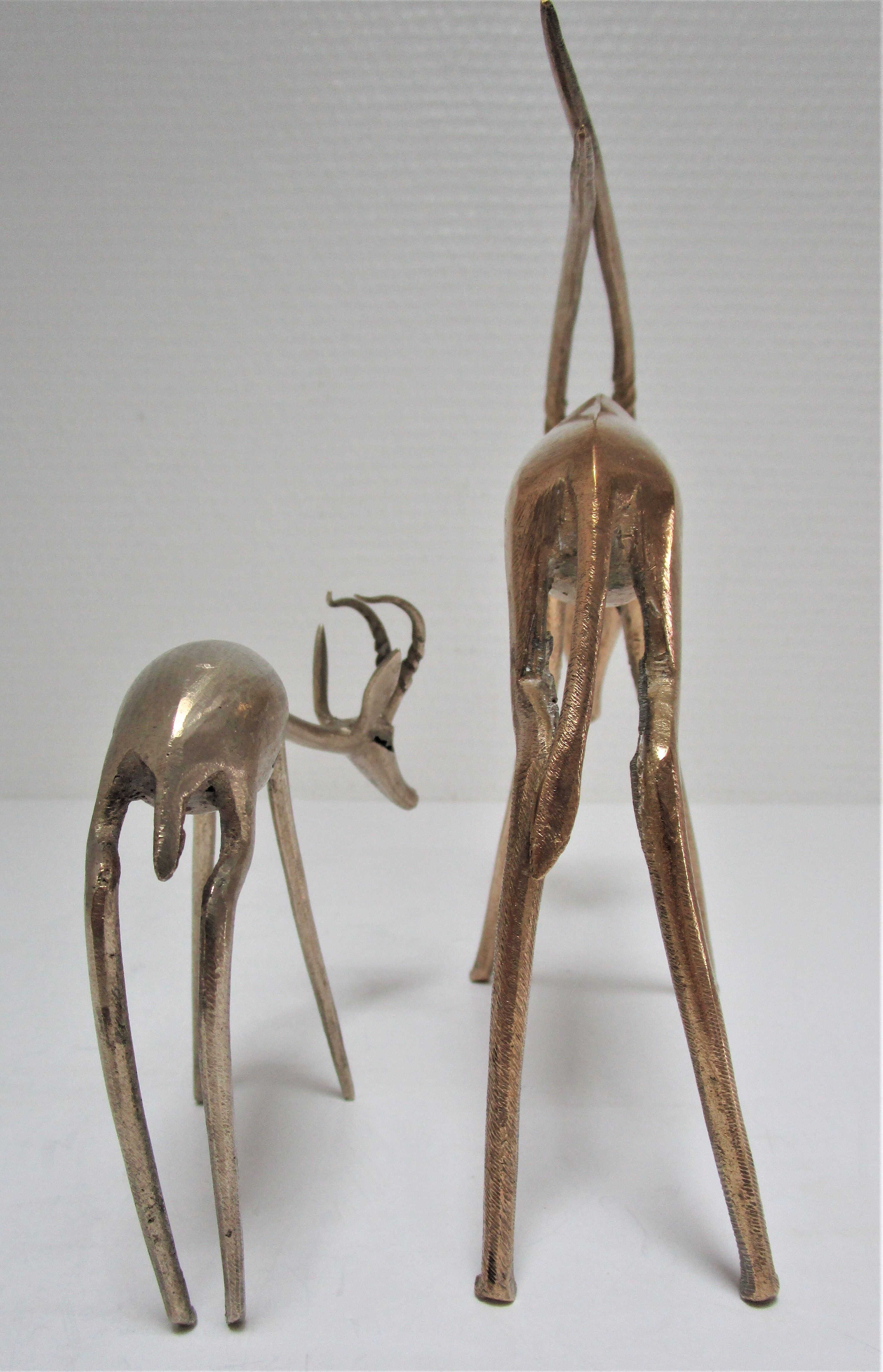Four vintage brass antelope gazelles