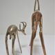 Four vintage brass antelope gazelles