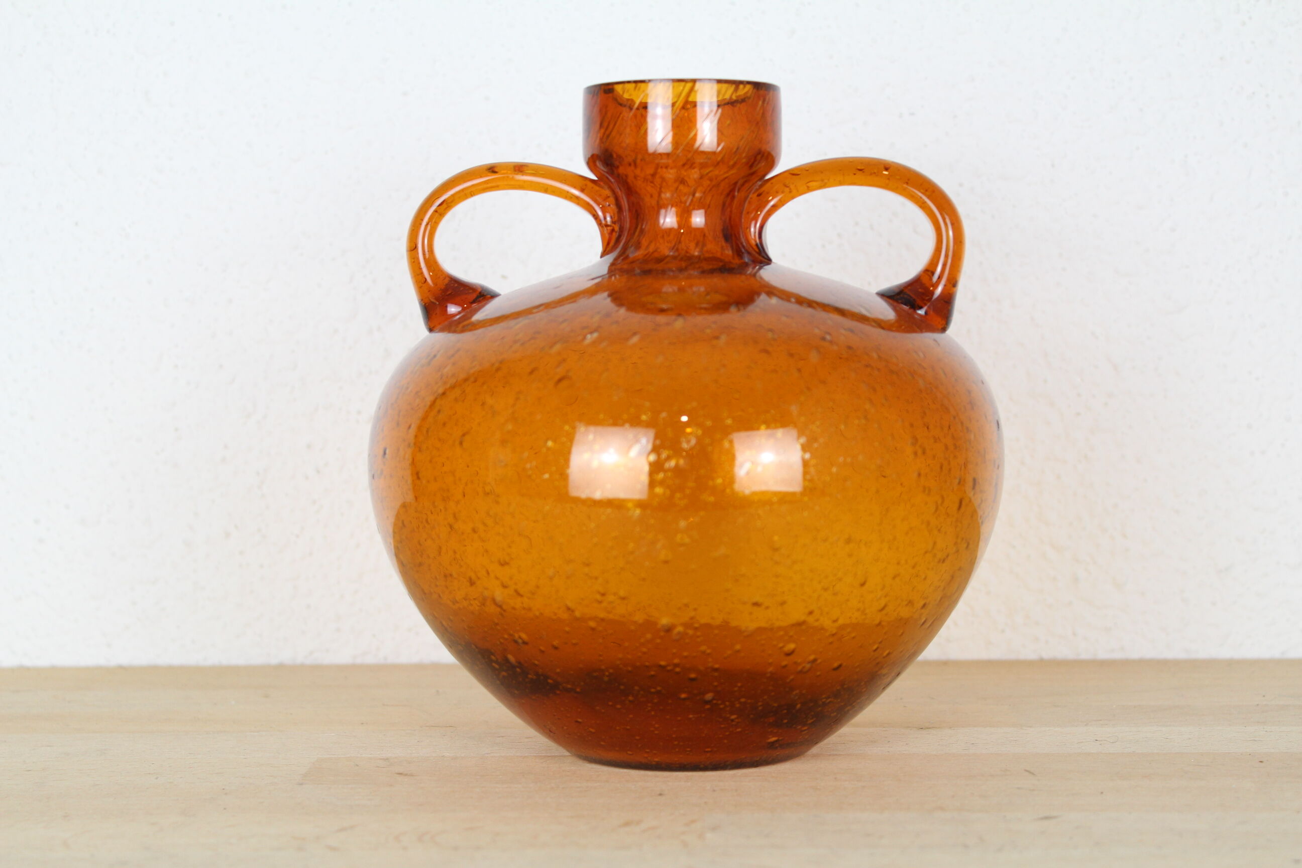 Biot's orange glass vase with orange coves